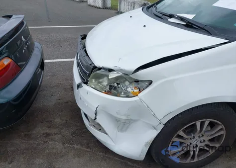 2012 Honda Odyssey Ex-L из США, поврежденный, VIN 5FNRL5H60CB070401